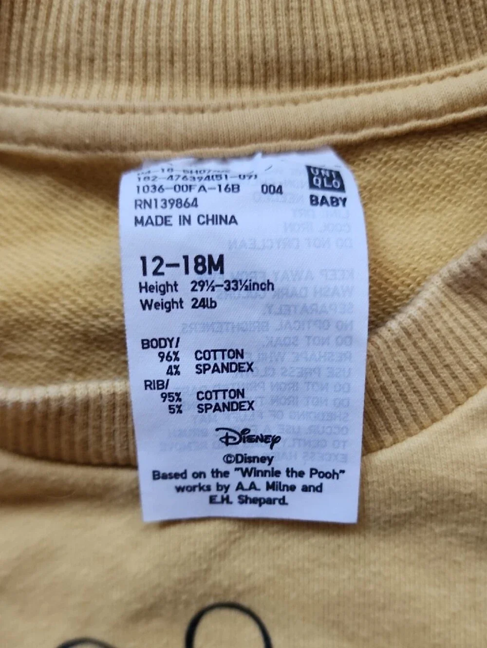 Uniqlo Kids Yellow Winnie the Pooh Sweatshirt with Red Accent